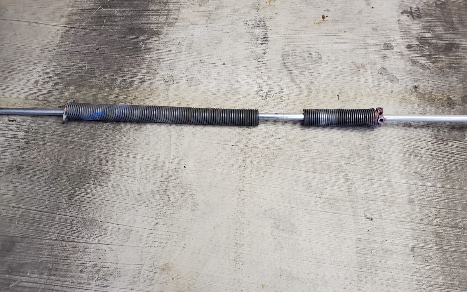 Before — snapped torsion spring